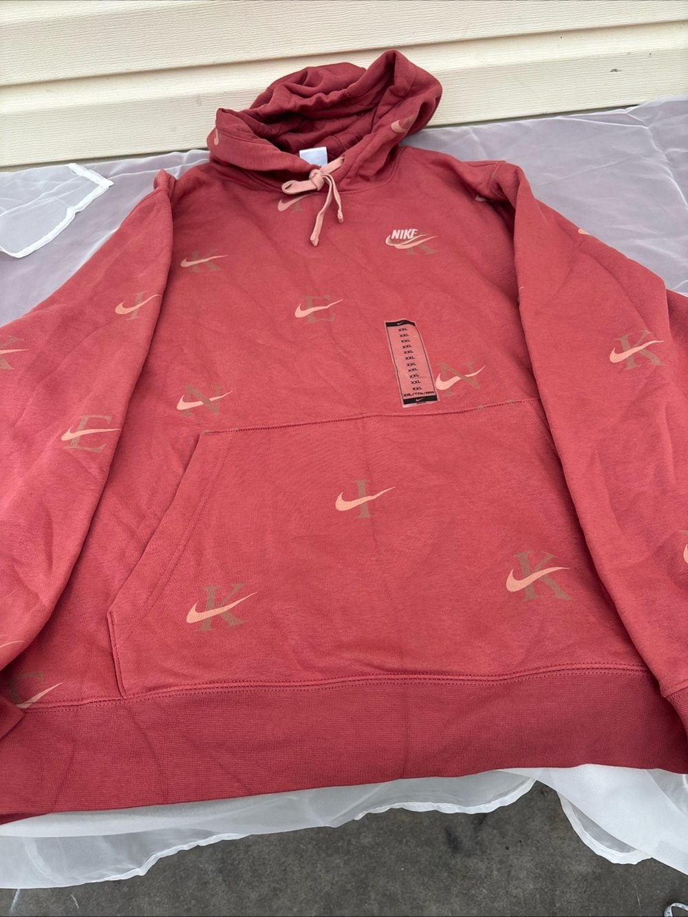 Nike Men’s Rust Red Hoodie with Beige Swoosh Print